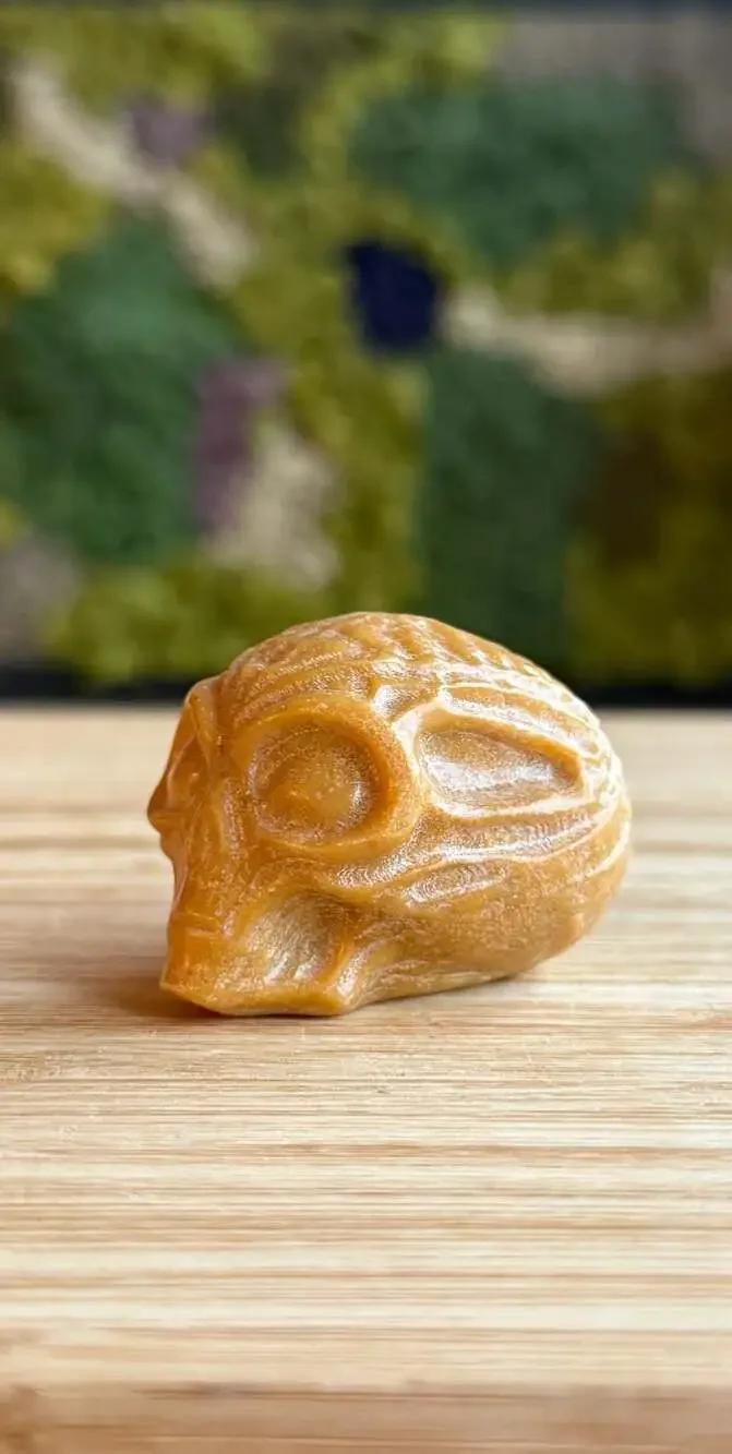 Hand Carved Yellow Calcite Crystal Alien Skull Figurine